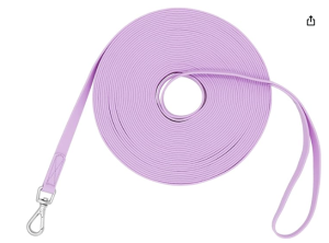 Lavender biothane leash artistically coiled